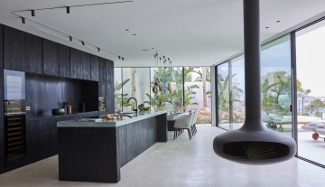 Resa Estates Ibiza koop sale Cala Moli villa seaviews modern kitchen fire place.jpg